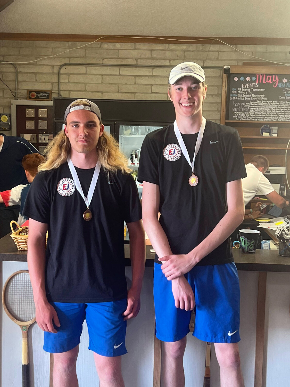 Reid Martin and Stuart Dow pose for a photo with their state medals following the state tournament in Yakima.